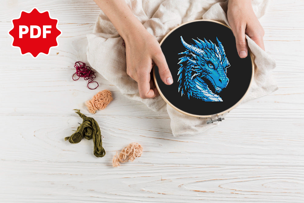 Piercing-eyed blue dragon embroidery pattern, mythical creature design